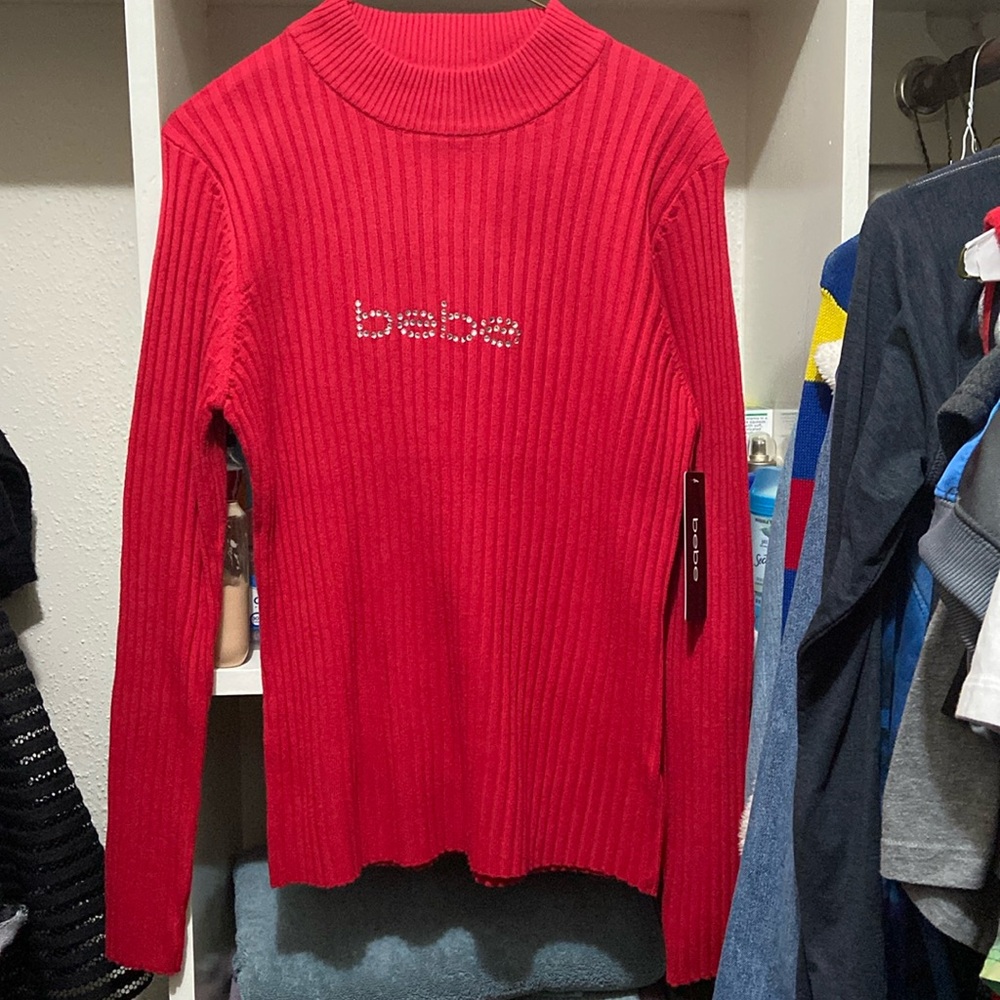 Red BeBe sweater with rhinestones
